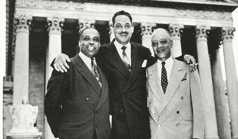 Attorneys George Hayes, Thurgood Marshall and James Nabrit (left to right) celebrate their victory in the 1954 case of Brown v Board of Education at the Supreme Court. Photo: Granger/Shutterstock