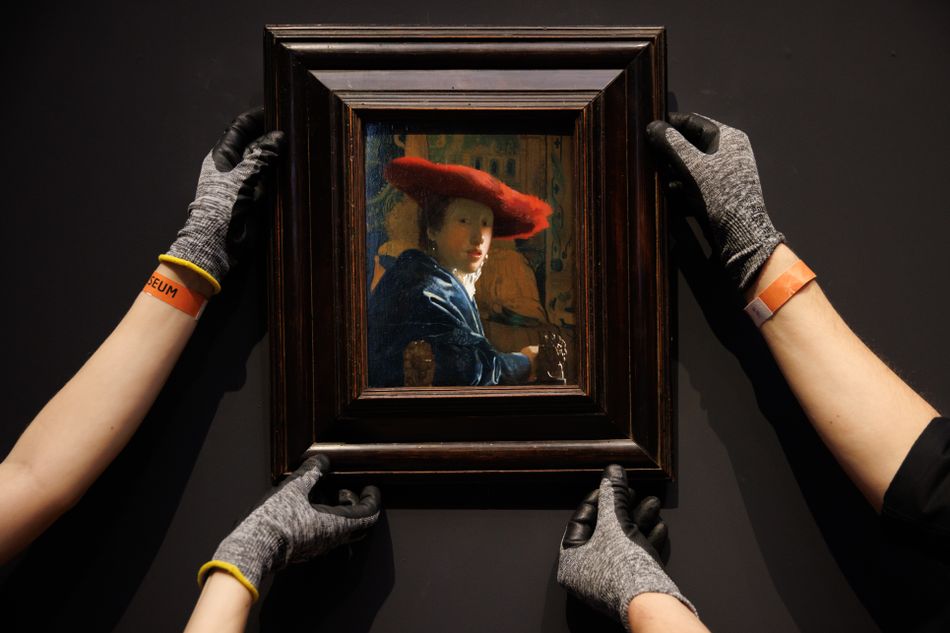 A fine balance: Vermeer’s “Girl with the Red Hat” (c. 1669) being installed ahead of the Rijksmuseum’s show