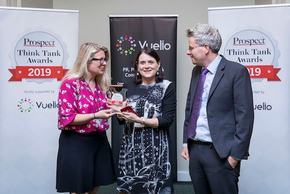 Joanna Arnold presents Bronwen Maddox of the Institute for Government with the award for Think Tank of the Year. Tom Clark looks on. Photos