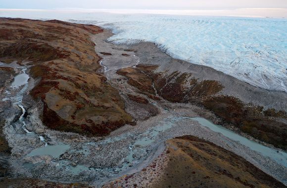 Over the past decade Greenland’s ice sheet has melted at a mostly constant, and sometimes accelerating, rate. Image: Mario Tama / Getty Images