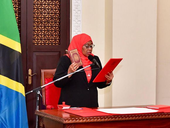 Samia Suluhu Hassan is sworn in as president of Tanzania, the country's first woman to hold the post. Photo: Xinhua / Alamy Stock Photo