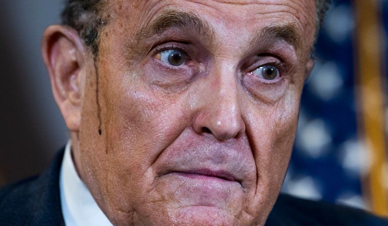 In a sweat: Rudy Giuliani, Trump’s attorney, inaccurately claimed that Trump had won a landslide © Tom Williams / CQ-Roll Call, Inc via Getty Images