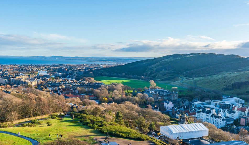 The Scottish Parliament, Holyrood palace, and the view from Edinburgh towards East Lothian.Image: Alamy