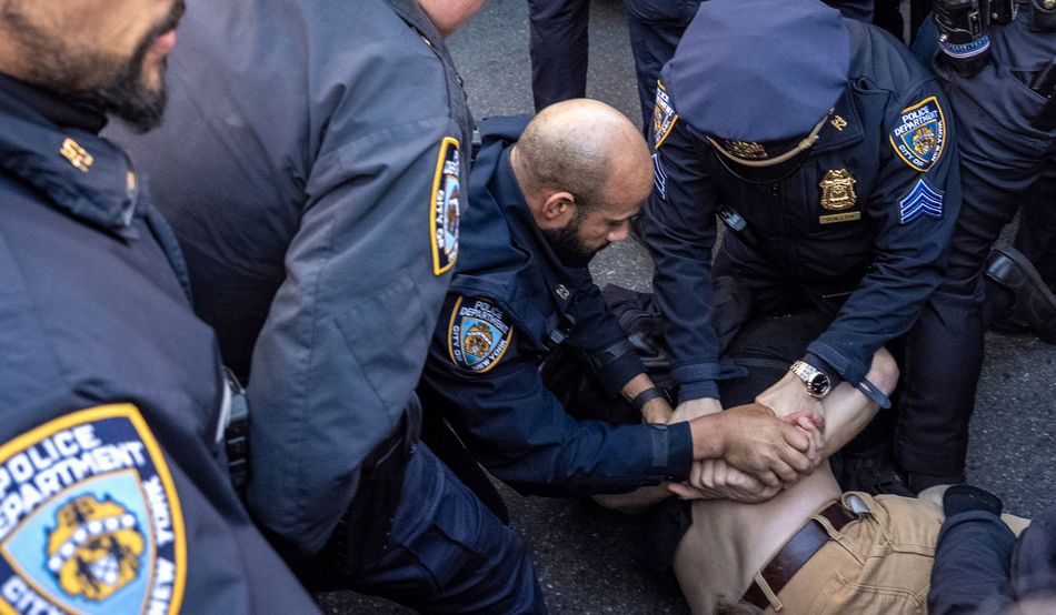 Marching for Mahmoud Khalil: NYPD officers pin a protester to the ground during an arrest on 10th March 2025. Image: David Dee Delgado-Getty Images