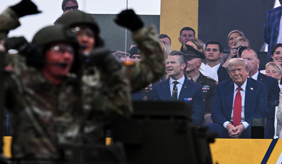 Trump and Pete Hegseth view United States army personnel and military equipment during a parade on 14th June 2025, in Washington, DC. Credit: Kenny Holston / Pool via CNP
