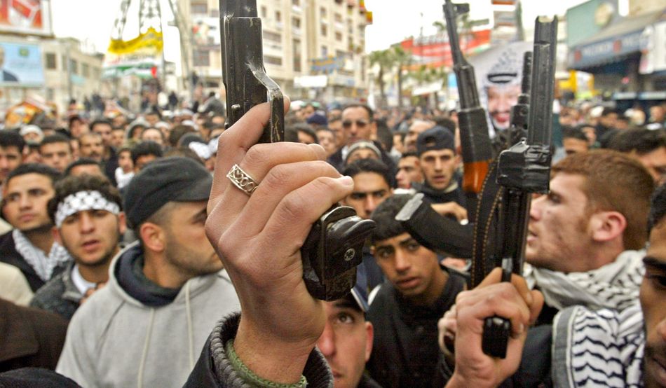 Angry at Hamas’s election win, Fatah gunmen and members of the Al-Aqsa Martyrs Brigade stormed Palestinian parliament buildings in Ramallah, 28th January 2006