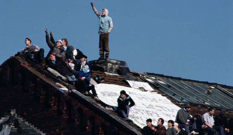 Riot on the roof: the disorder at HMP Strangeways 
in 1990 spread to other facilities © Tom Stoddart/Getty Images