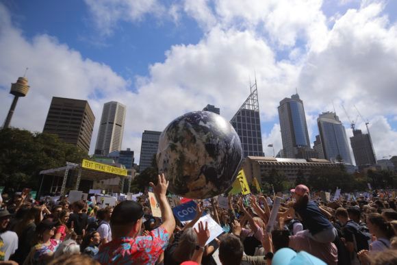 Protesters play with a giant inflatable globe during The Global Strike 4 Climate rally in Sydney, Friday, September 20, 2019. The Global Strike 4 Climate will take place in 110 towns and cities across Australia, with organisers demanding government and bu