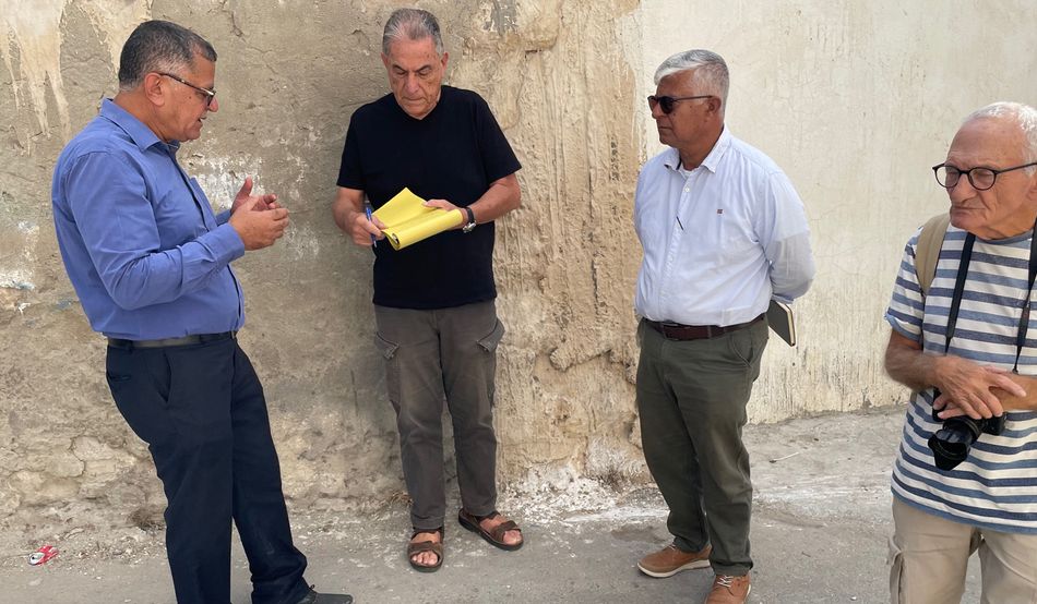 Gideon Levy, second from left, interviews the mayor of Anza, Thaisir Sadaqa, left, with Abdulkarim Sadi from Israeli NGO B’Tselem. Photographer Alex Levac is furthest to the right. Image: Alan Rusbridger
