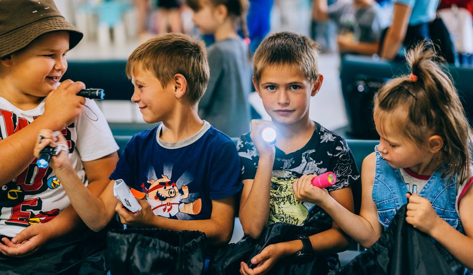 The children of Yavkyne are given life-saving lessons on how to spot a landmine. Credit: Julia Kochetova
