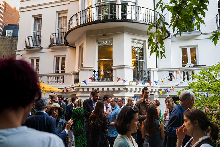 Guests mingle at the Prospect Summer Party 2023