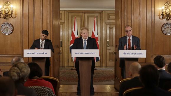 Rishi Sunak, Boris Johnson and Patrick Vallance give a coronavirus briefing at Downing Street in the early days of the pandemic. © MATT DUNHAM/POOL/EPA-EFE/Shutterstock