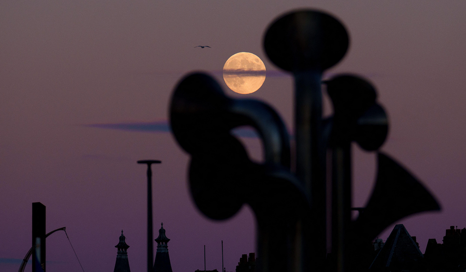 Stranger than fiction? The moon rises over a town in Lancashire, the real-life basis for Jeff Noon’s Brendleshire. Image: Jon Super / Alamy