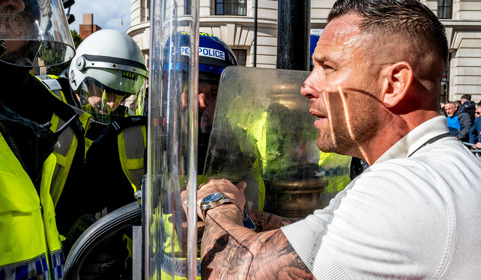 In Epsom, Danny Tommo (real name Daniel Thomas), an associate of Stephen Yaxley-Lennon, turned up with a megaphone. Here he is pictured at the Unite The Kingdom Rally in London. Image: Alamy 