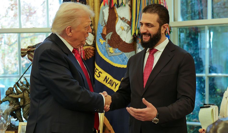 Donald Trump shaking hands with Syria’s President Ahmad al-Sharaa at the White House on 10th November. Image: Syrian Presidency press office via AP / Alamy