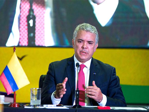 President Iván Duque uses an old map to navigate a new era of violence © Long Visual Press / Alamy Stock Photo