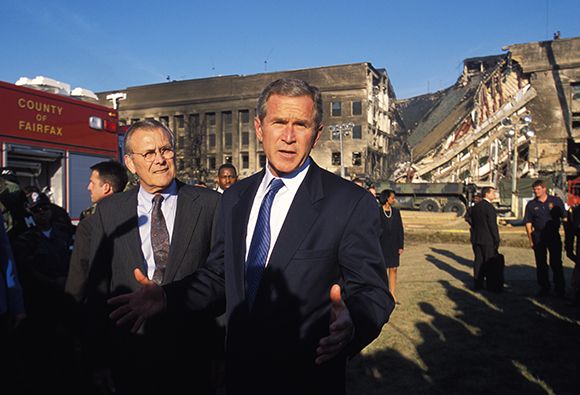 U.S. President George W. Bush and Secretary of Defense Donald Rumsfeld visit the Pentagon to view the damage the day after the September 11, 2001 terrorist attacks. (Photo by Brooks Kraft LLC/Corbis via Getty Images)