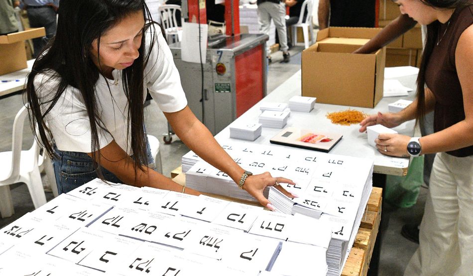 Ballot papers being prepared ahead earlier this month, ahead of elections in Israel. Image: Alamy