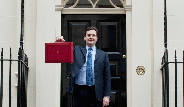 His cuts left no area of public service untouched. Pictured here on Budget day in March 2012 © Associated Press / Alamy Stock Photo