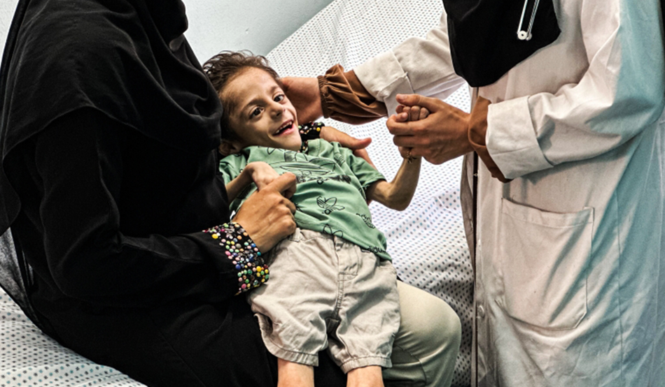 A child in Gaza with a rare metabolic disorder, which can be life-threatening if left untreated. Image: Haneen Maher Salem / Medical Aid for Palestinians