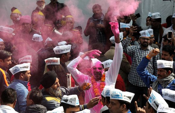 Mandatory Credit: Photo by RAJAT GUPTA/EPA-EFE/Shutterstock (10553698h) Aam Aadmi Party (AAP) supporters celebrate after the party won the Delhi Assembly elections, New Delhi, India, 11 February 2020. AAP is set to form the government for the second term