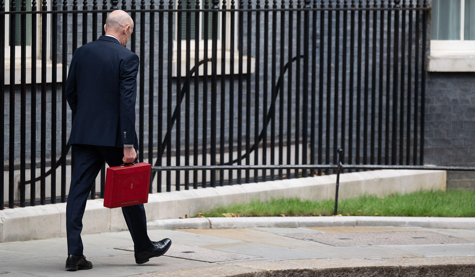 John Healey leaving Number 11 Downing Street to present the budget. Image: Will Colebourne / Alamy