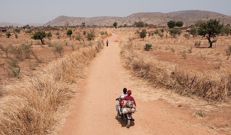 Travellers on the road leading through to Kadugli, the capital of South Kordofan state © Guy Peterson