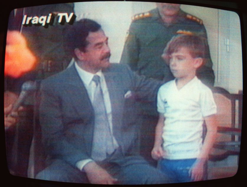Saddam meets British detainee Stuart Lockwood AFP via Getty Images